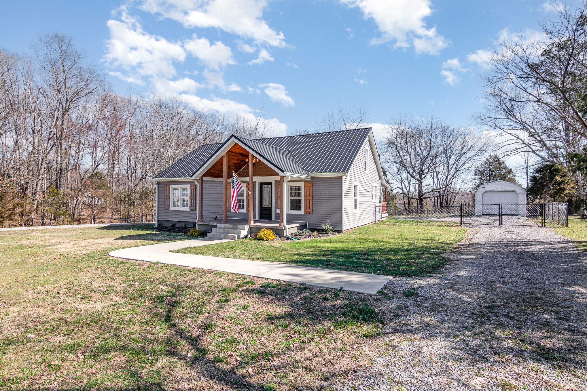 4901 Marion Road Cunningham, TN 37052 - Photo 5 of 35 a front view of house with yard and green space