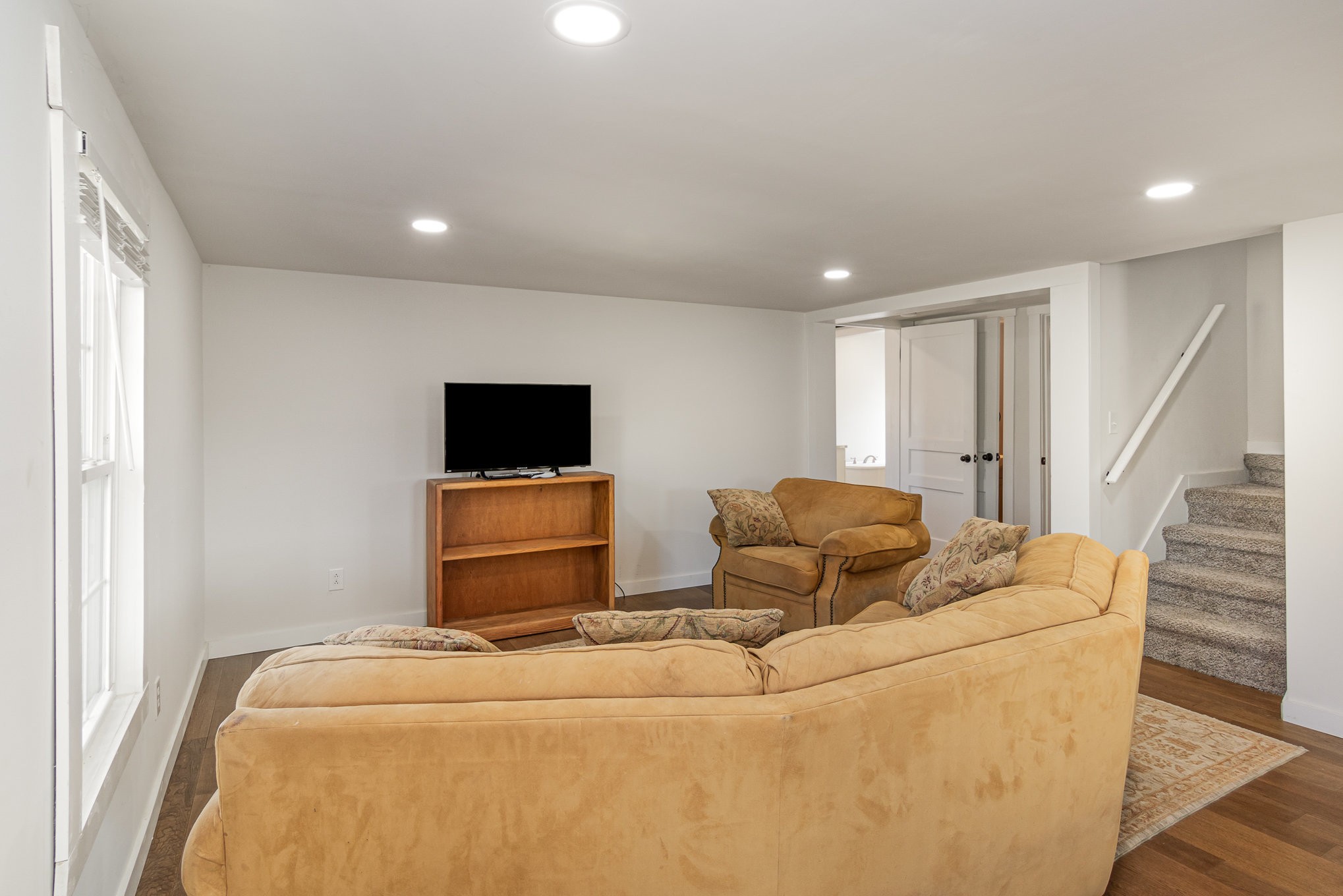 4901 Marion Road Cunningham, TN 37052 - Photo 7 of 35 a bedroom with furniture and a flat screen tv