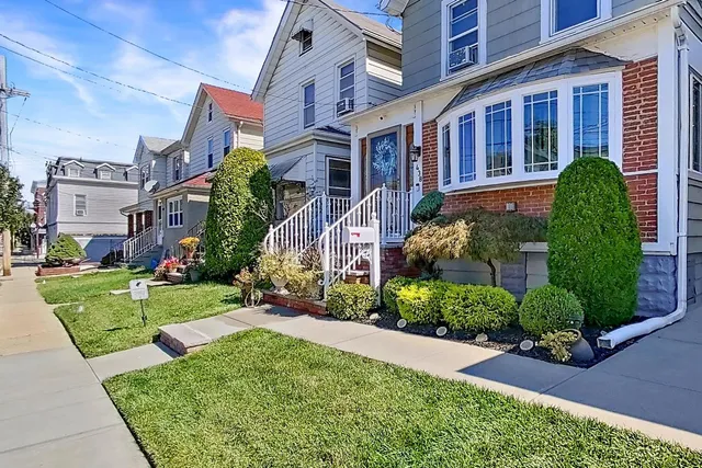 a view of yard with patio