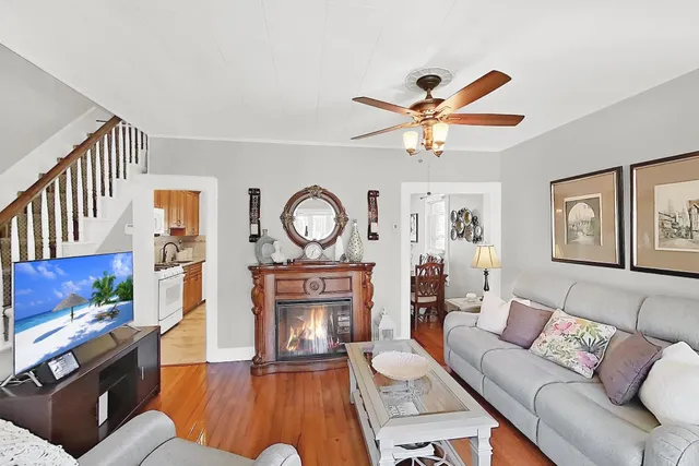 a room with furniture and large windows