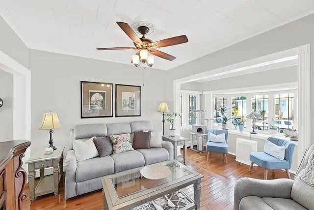a kitchen with a sink stove top oven and cabinets