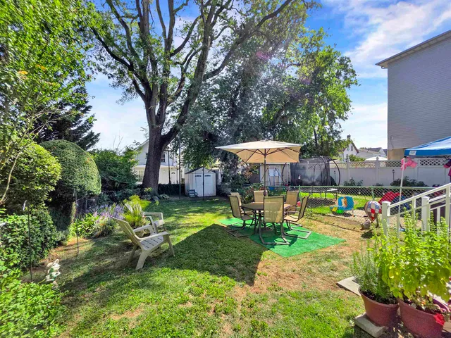 a garden view with a seating space