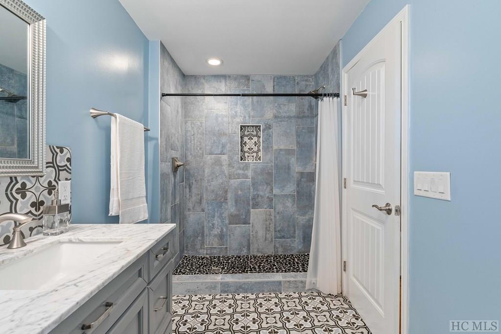 703 Dog Mountain Road Highlands, NC 28741 - Photo 23 of 51 En Suite Bathroom for Bedroom Two on Main Level
