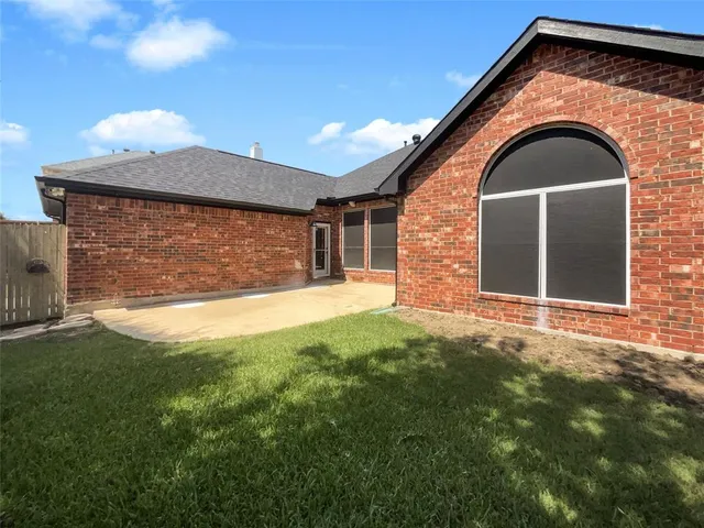 a view of front door of house with outdoor space