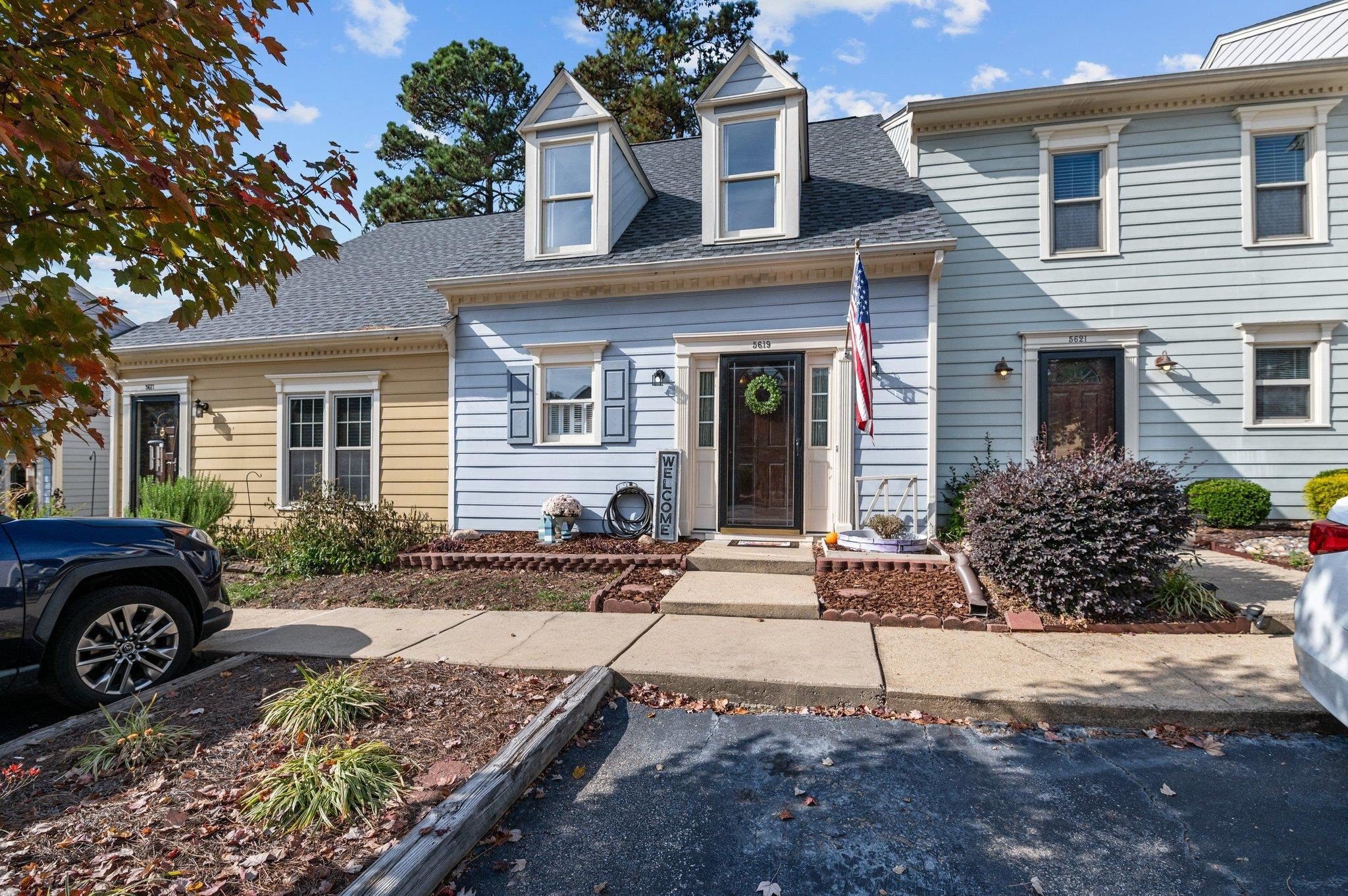 a front view of a house with garden