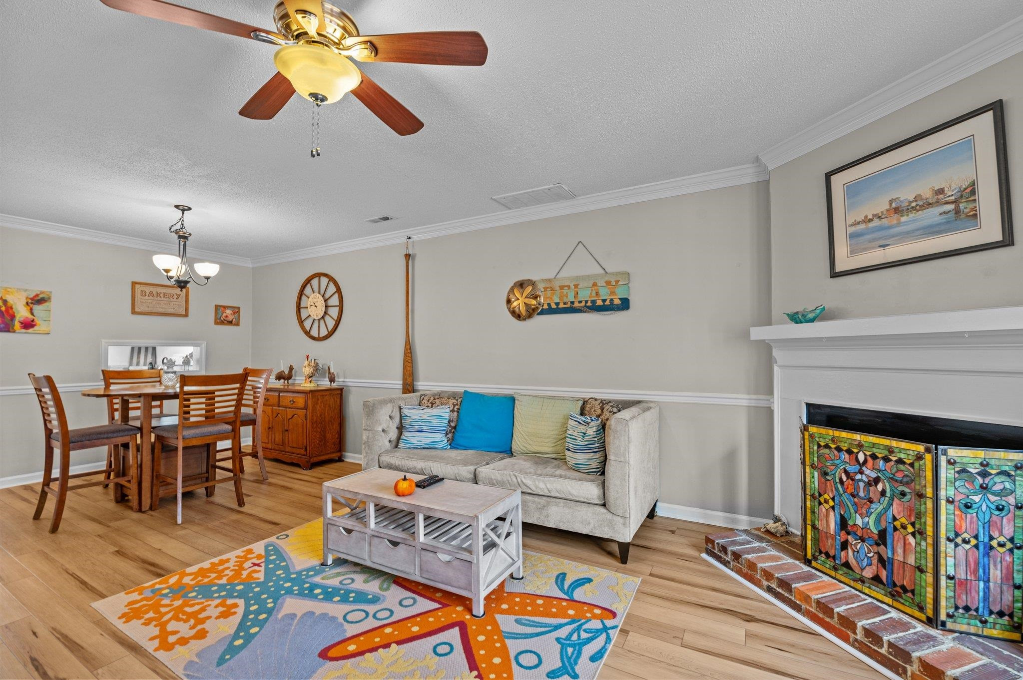 5619 Split Oak Way Raleigh, NC 27609 - Photo 9 of 36 a living room with furniture and a fireplace