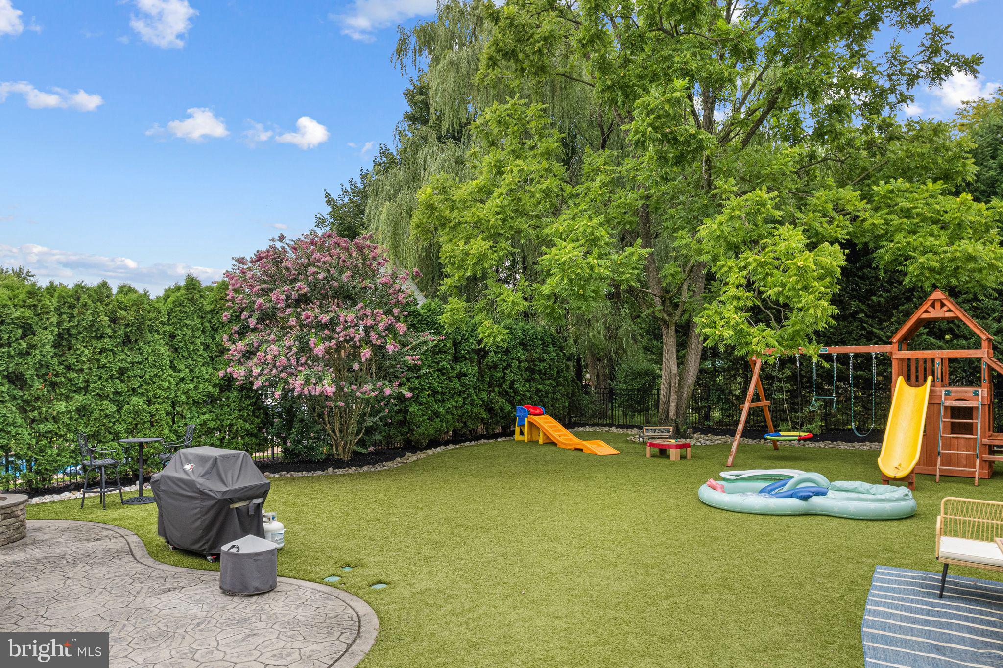 415 Washington Avenue Haddonfield, NJ 08033 - Photo 47 of 51 a view of a backyard with swimming pool