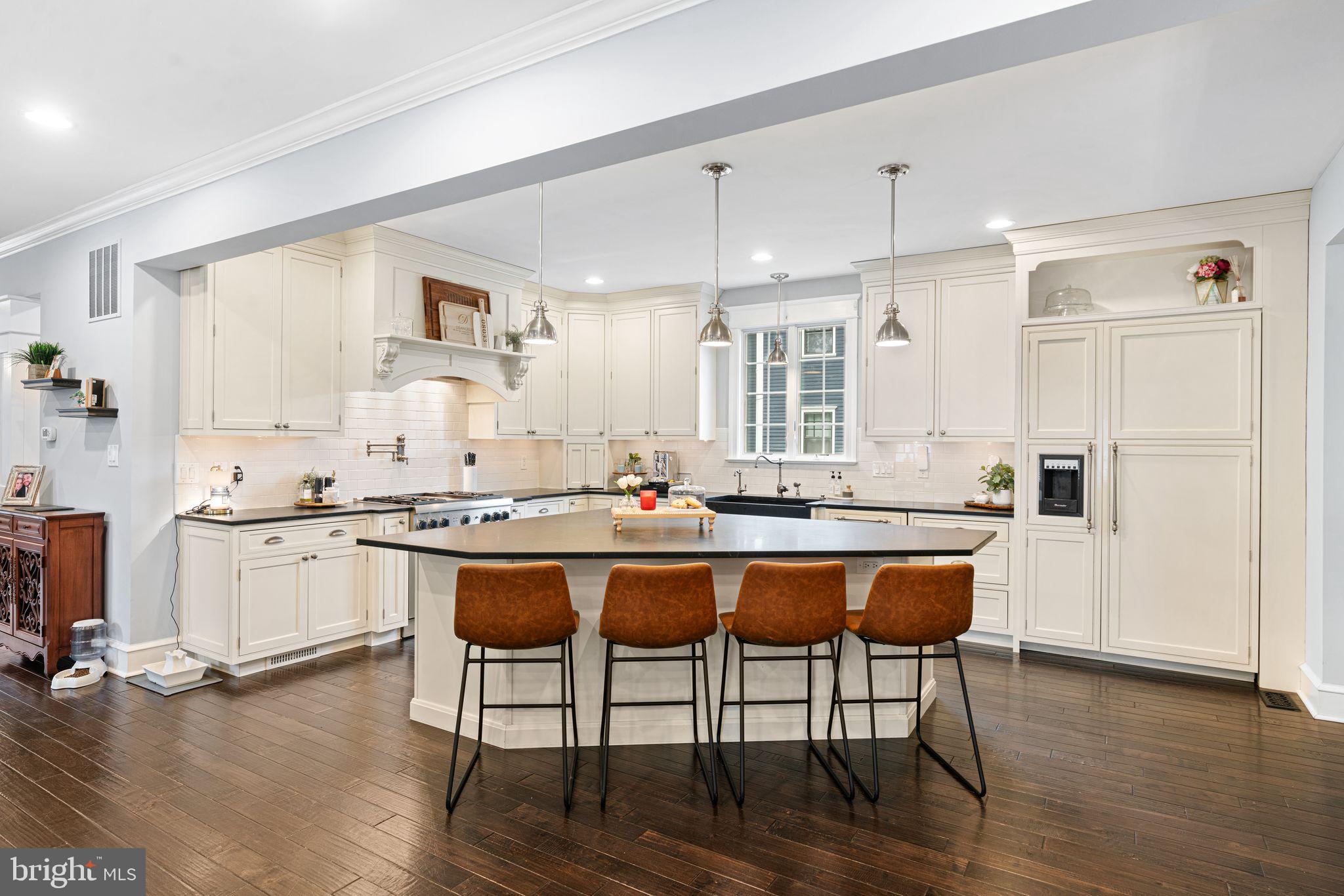 415 Washington Avenue Haddonfield, NJ 08033 - Photo 6 of 51 a large kitchen with cabinets table and chairs