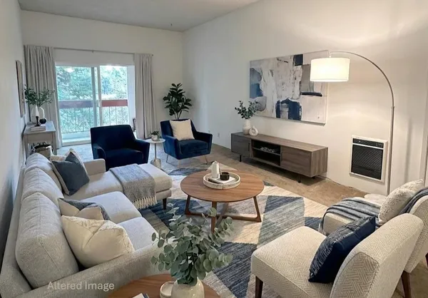 a bed room with a bed window and a chair