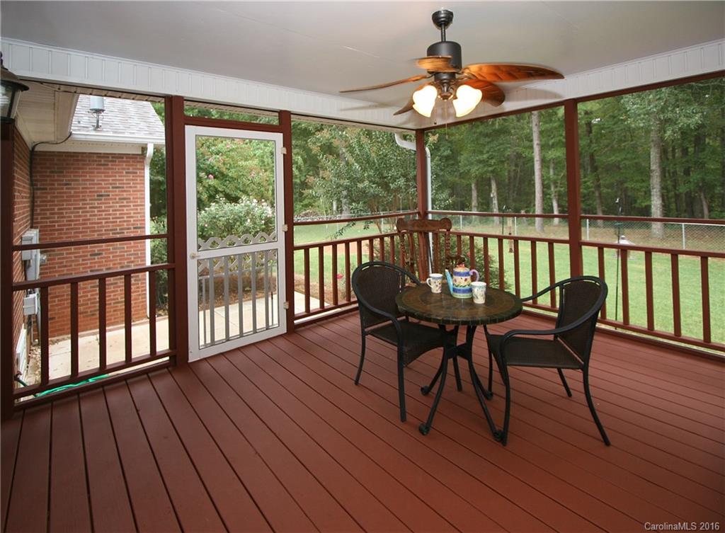 9505 Mini Ranch Road Waxhaw, NC 28173 - Photo 11 of 24 a view of a dining room with furniture window and wooden floor