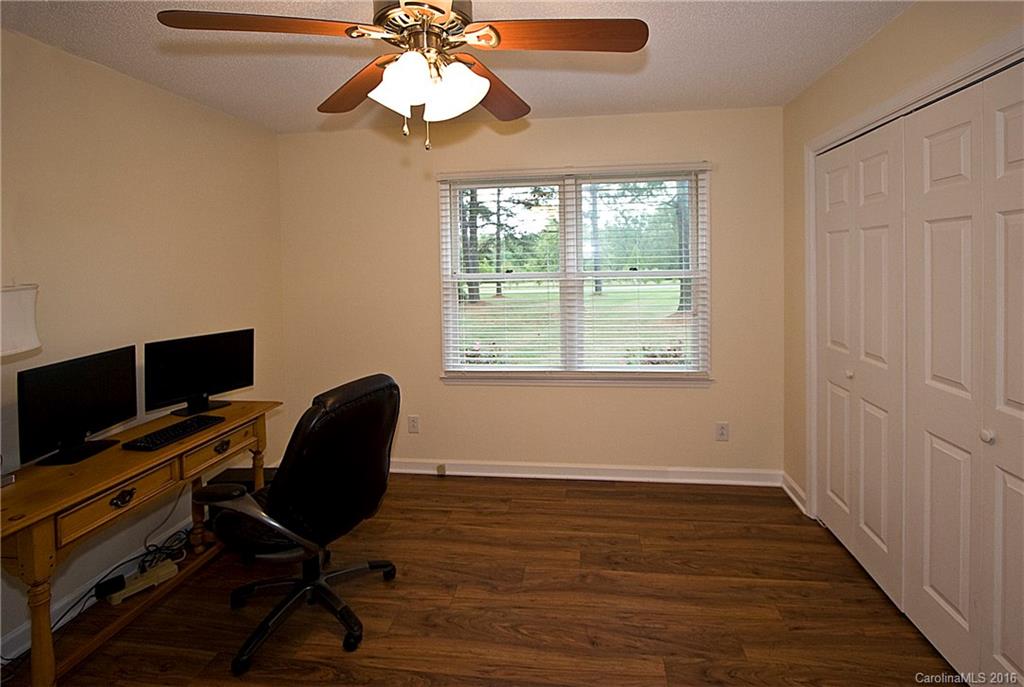 9505 Mini Ranch Road Waxhaw, NC 28173 - Photo 16 of 24 a view of a workspace with furniture and a window