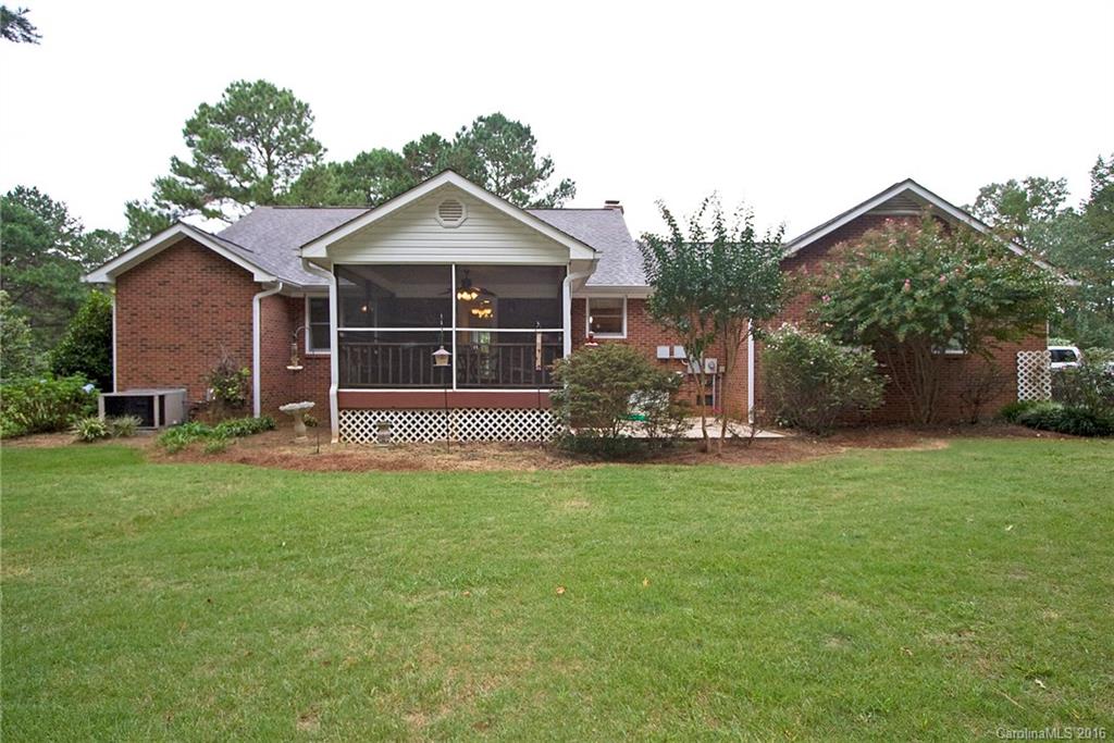 9505 Mini Ranch Road Waxhaw, NC 28173 - Photo 22 of 24 a front view of a house with garden