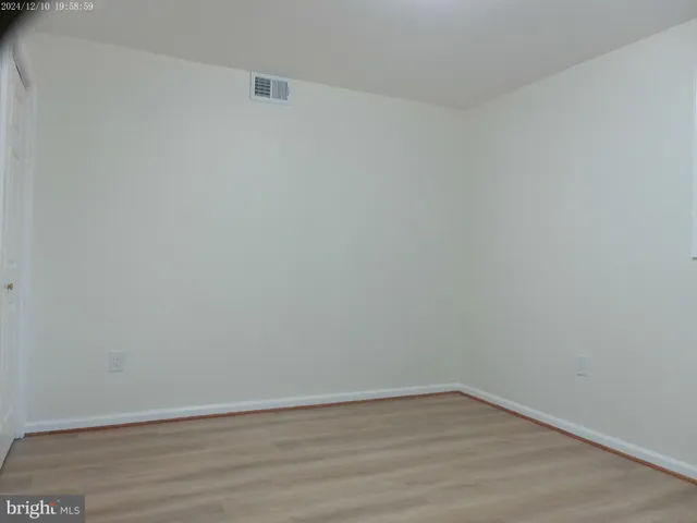 a view of a house with a yard and garage