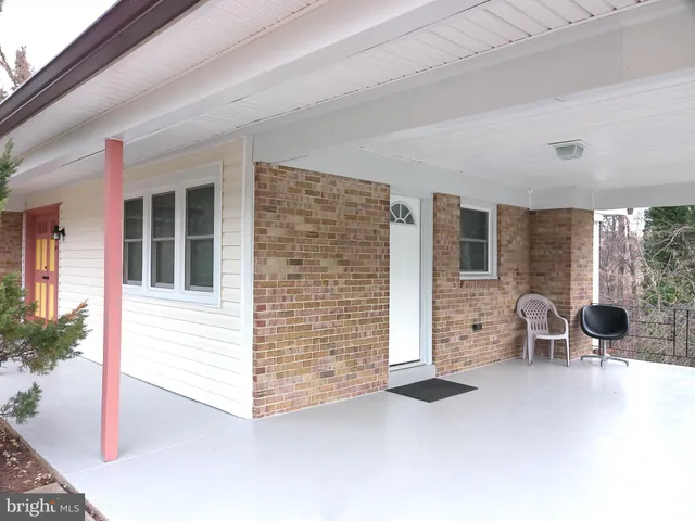 a bathroom with a double vanity sink and mirror