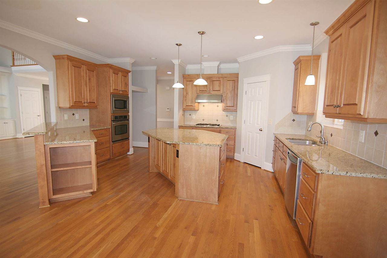1316 Tacketts Pond Drive Raleigh, NC 27614 - Photo 8 of 25 Kitchen Open to Family Room