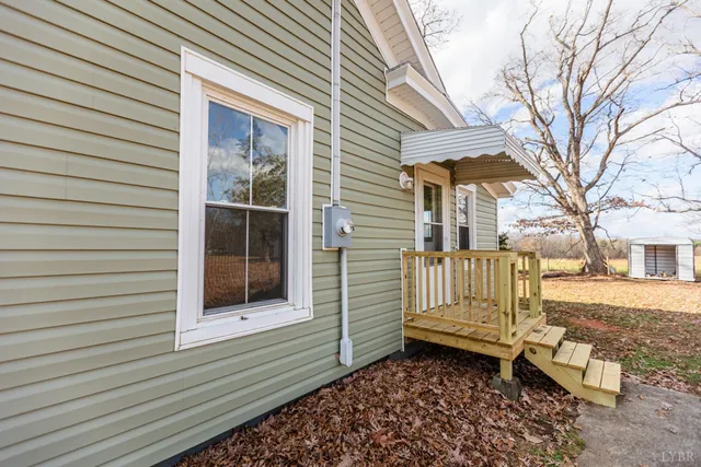 a view of a bench in the backyard