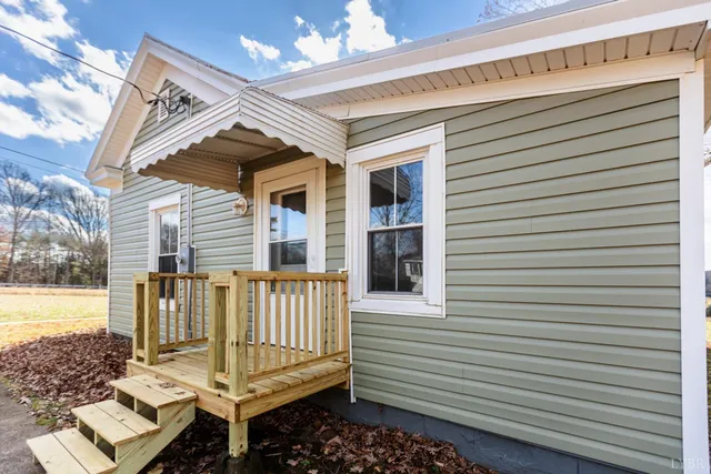 a view of a chair and table in the balcony