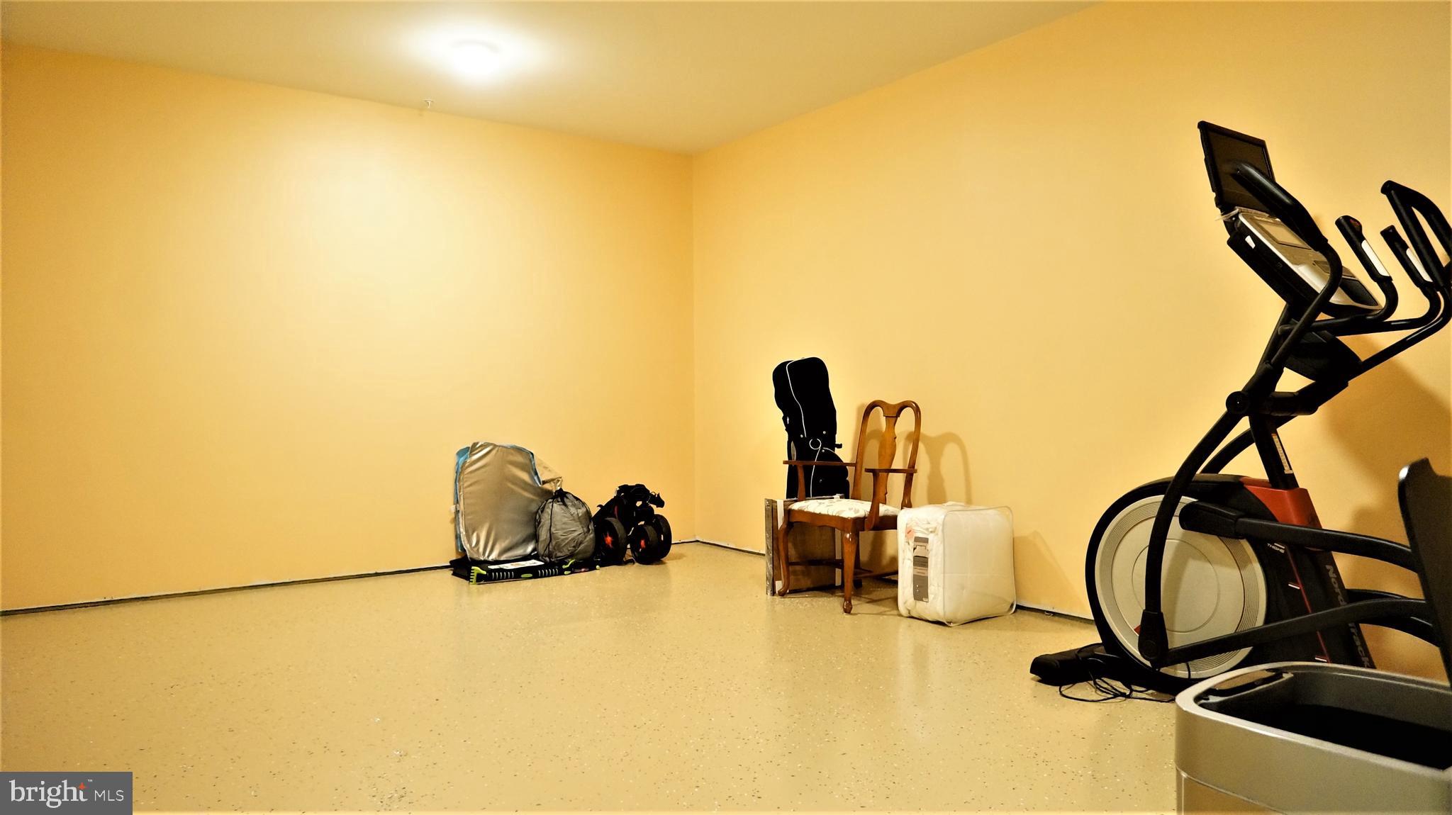 1951 Reston Vly Way, Unit 10 Reston, VA 20191 - Photo 45 of 50 a view of a room with gym equipment