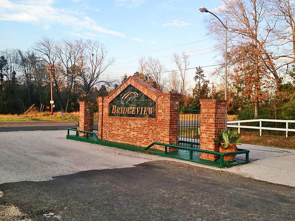 145 Bridgeway Onalaska, TX 77360 - Photo 20 of 23 Entrance to the subdivision.
