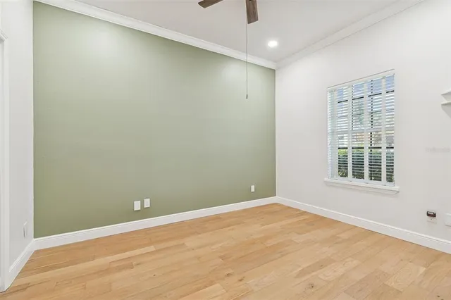 a bathroom with a sink toilet vanity and shower