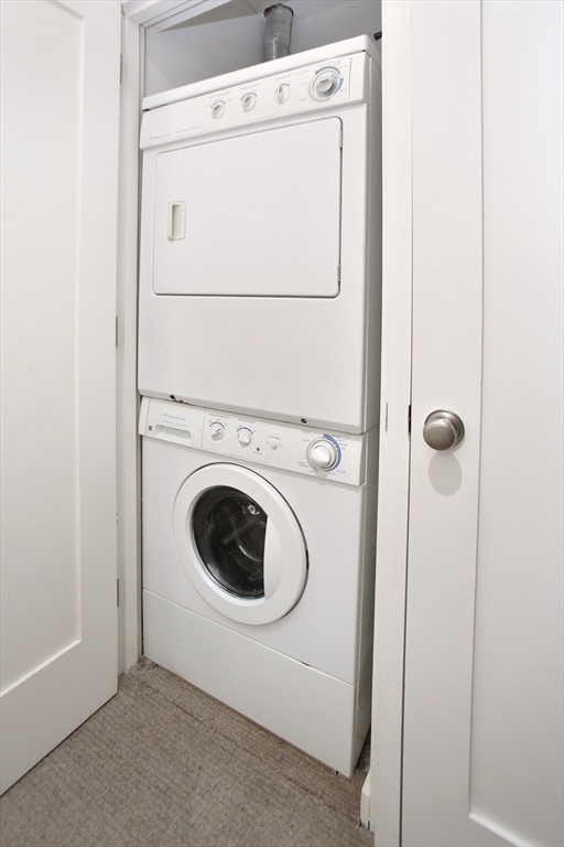 615 Massachusetts Avenue, Unit 2 Boston, MA 02118 - Photo 15 of 32 a utility room with dryer and washer