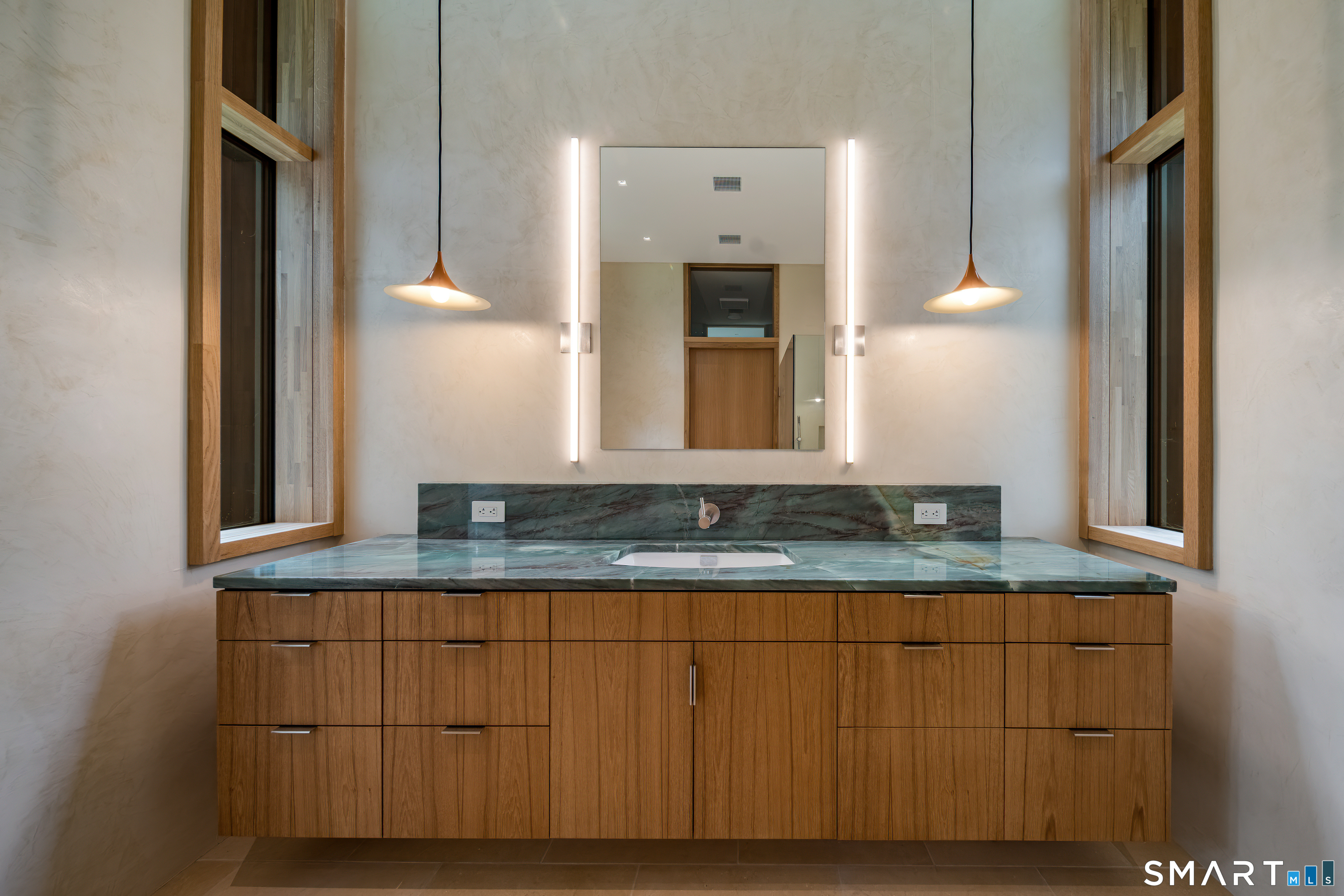314 Ferry Road Old Lyme, CT 06371 - Photo 15 of 39 a bathroom with a granite countertop sink and a mirror