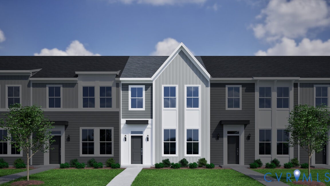 a view of house with yard and front view