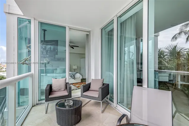 a outdoor living space with furniture and a potted plant