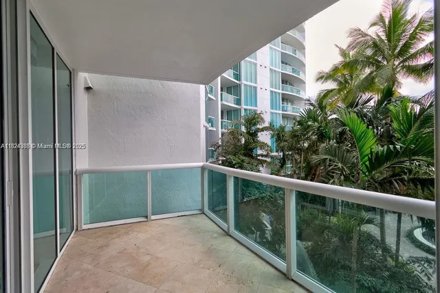 a view of a balcony with plants