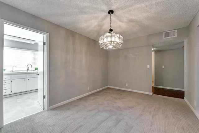 a view of a chandelier in a room