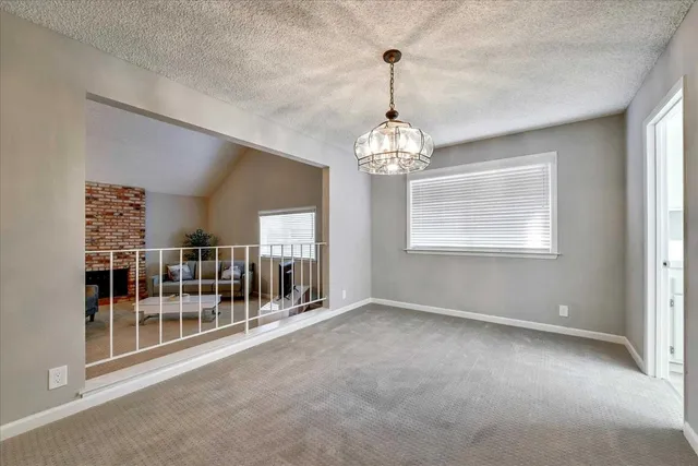 a view of a room with lots of windows