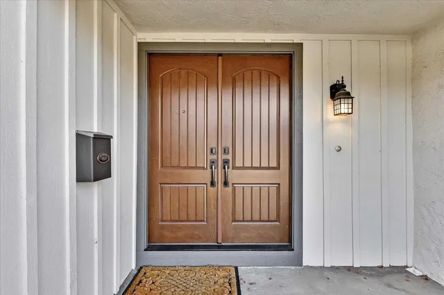 a view of a swimming pool with a patio