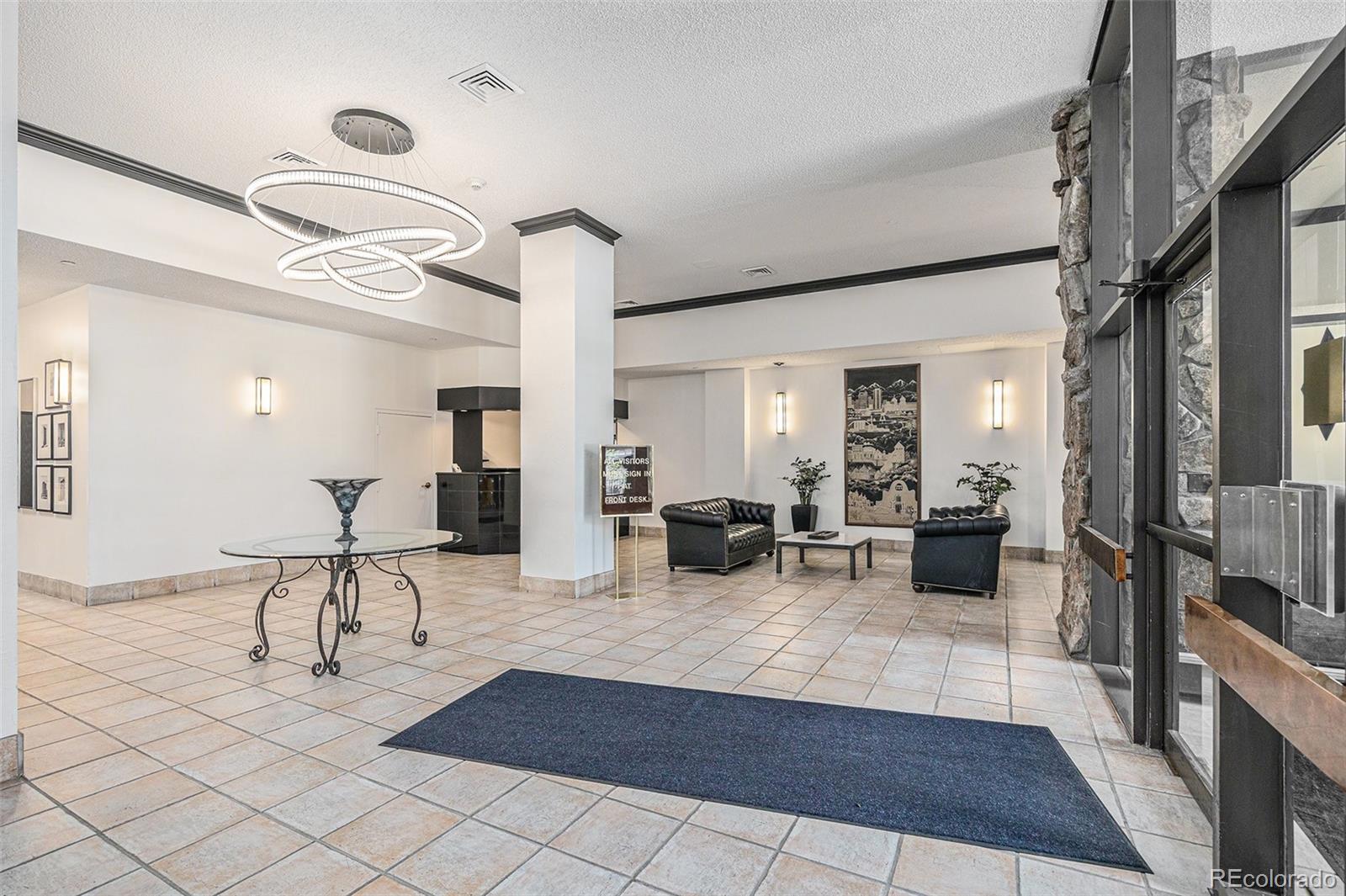 1020 15th Street, Unit 25B Denver, CO 80202 - Photo 19 of 33 a view of living room with furniture and wooden floor