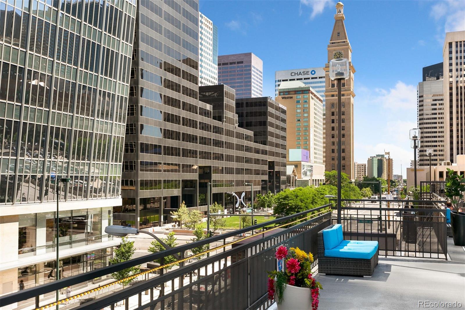 1020 15th Street, Unit 25B Denver, CO 80202 - Photo 21 of 33 a city street filled with lots of tall buildings