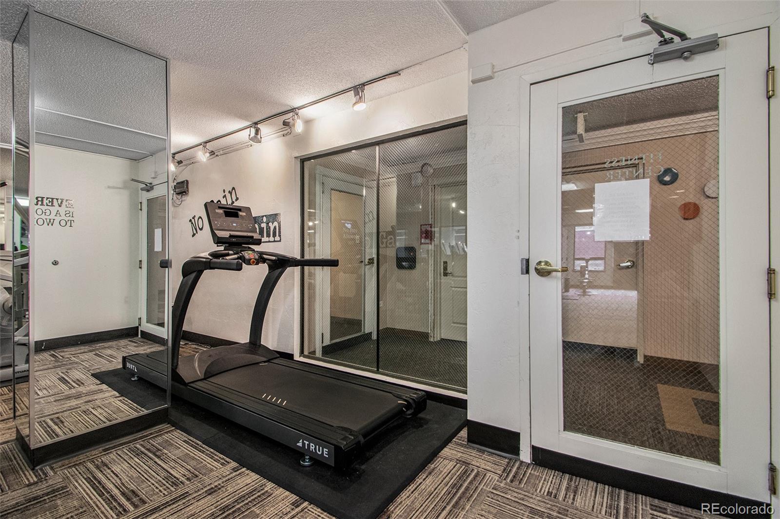 1020 15th Street, Unit 25B Denver, CO 80202 - Photo 26 of 33 a room with gym equipment