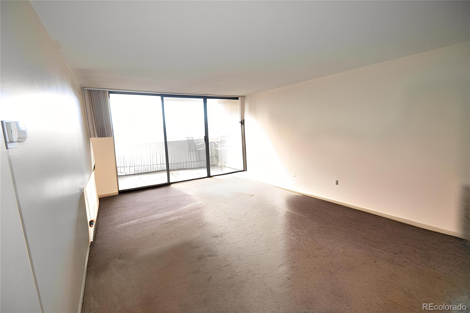 1020 15th Street, Unit 25B Denver, CO 80202 - Photo 4 of 33 a view of an empty room with a window