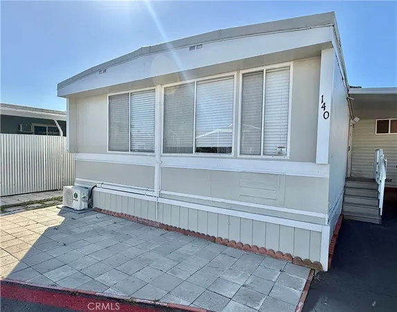 a view of a house with a large window