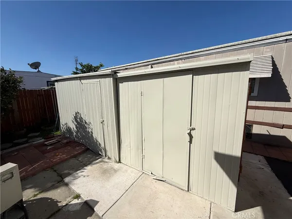 a view of a back yard from a glass door