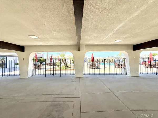 a view of an entryway with a floor to ceiling window