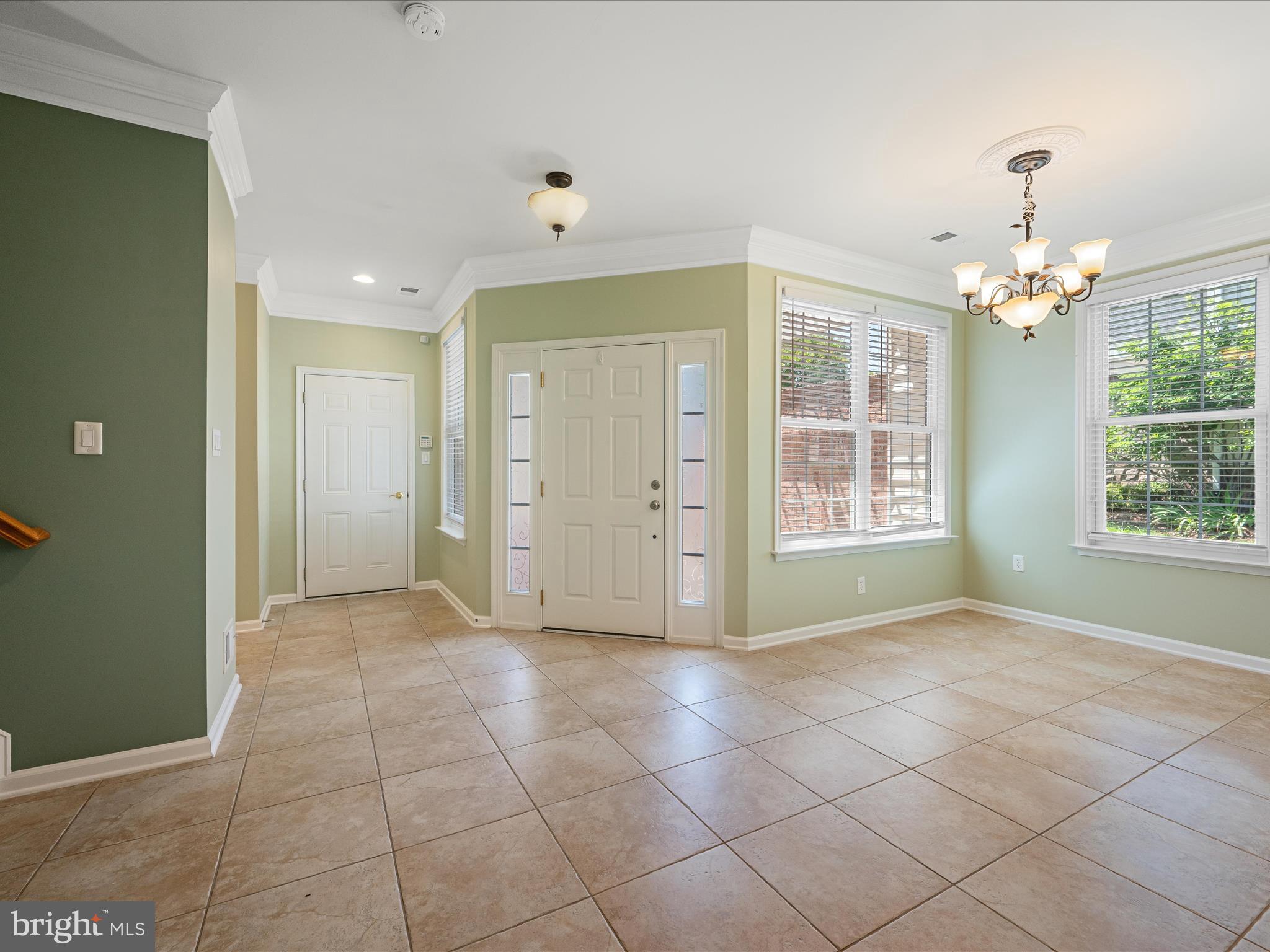 44322 Stableford Square Ashburn, VA 20147 - Photo 12 of 63 an empty room with kitchen and window