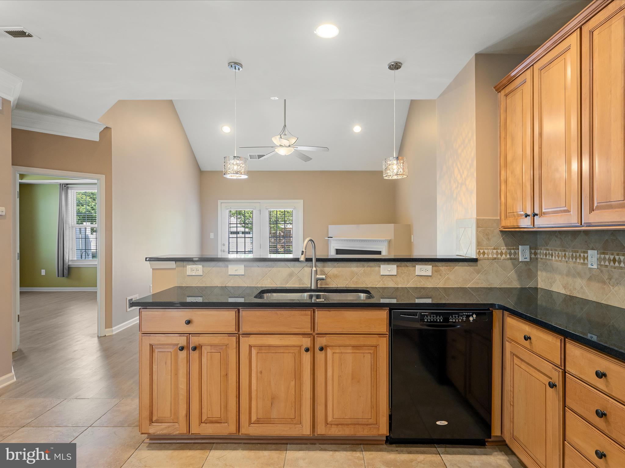 44322 Stableford Square Ashburn, VA 20147 - Photo 15 of 63 a kitchen with granite countertop a sink and cabinets
