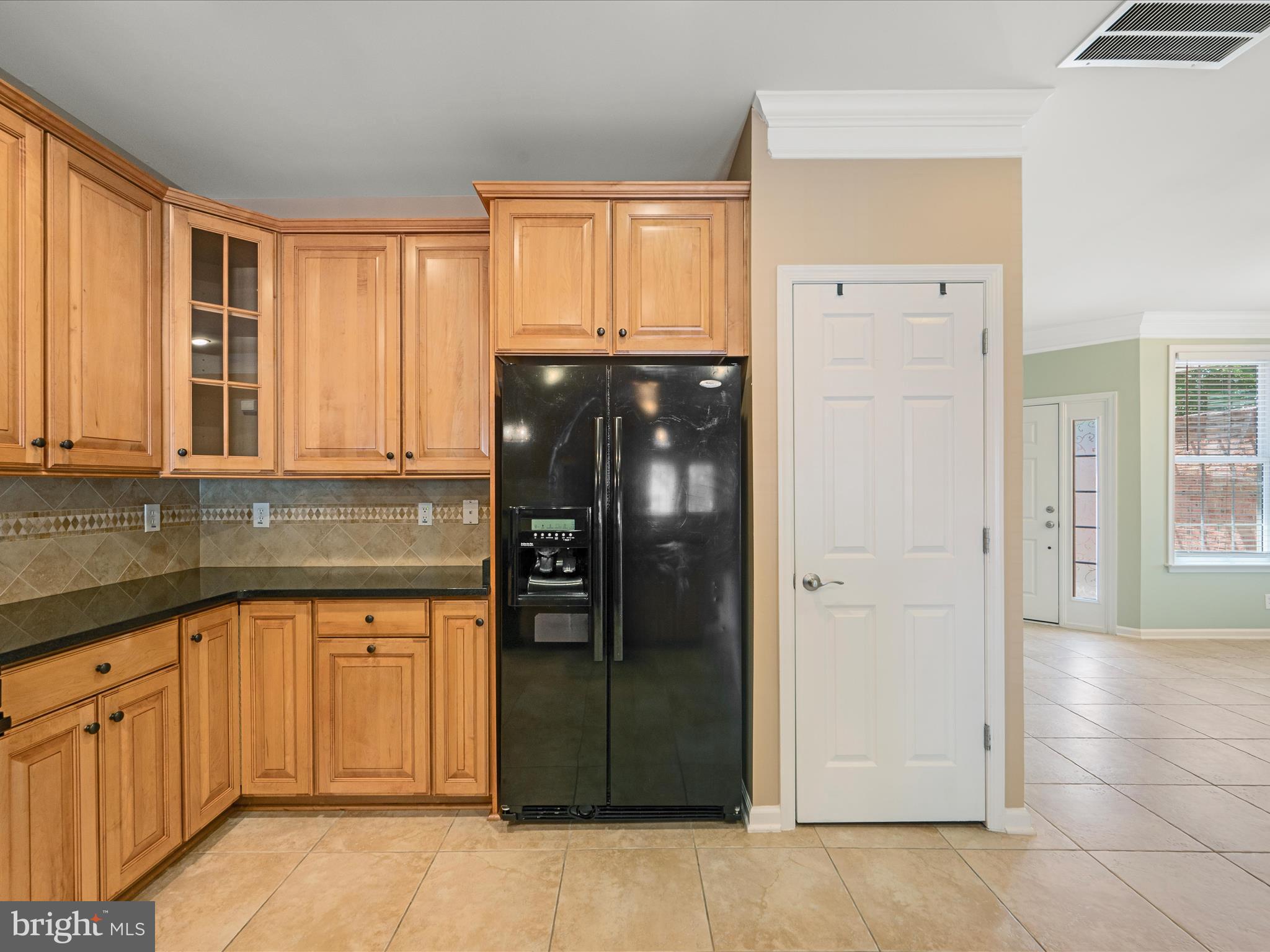 44322 Stableford Square Ashburn, VA 20147 - Photo 16 of 63 a kitchen with stainless steel appliances granite countertop a refrigerator and a sink