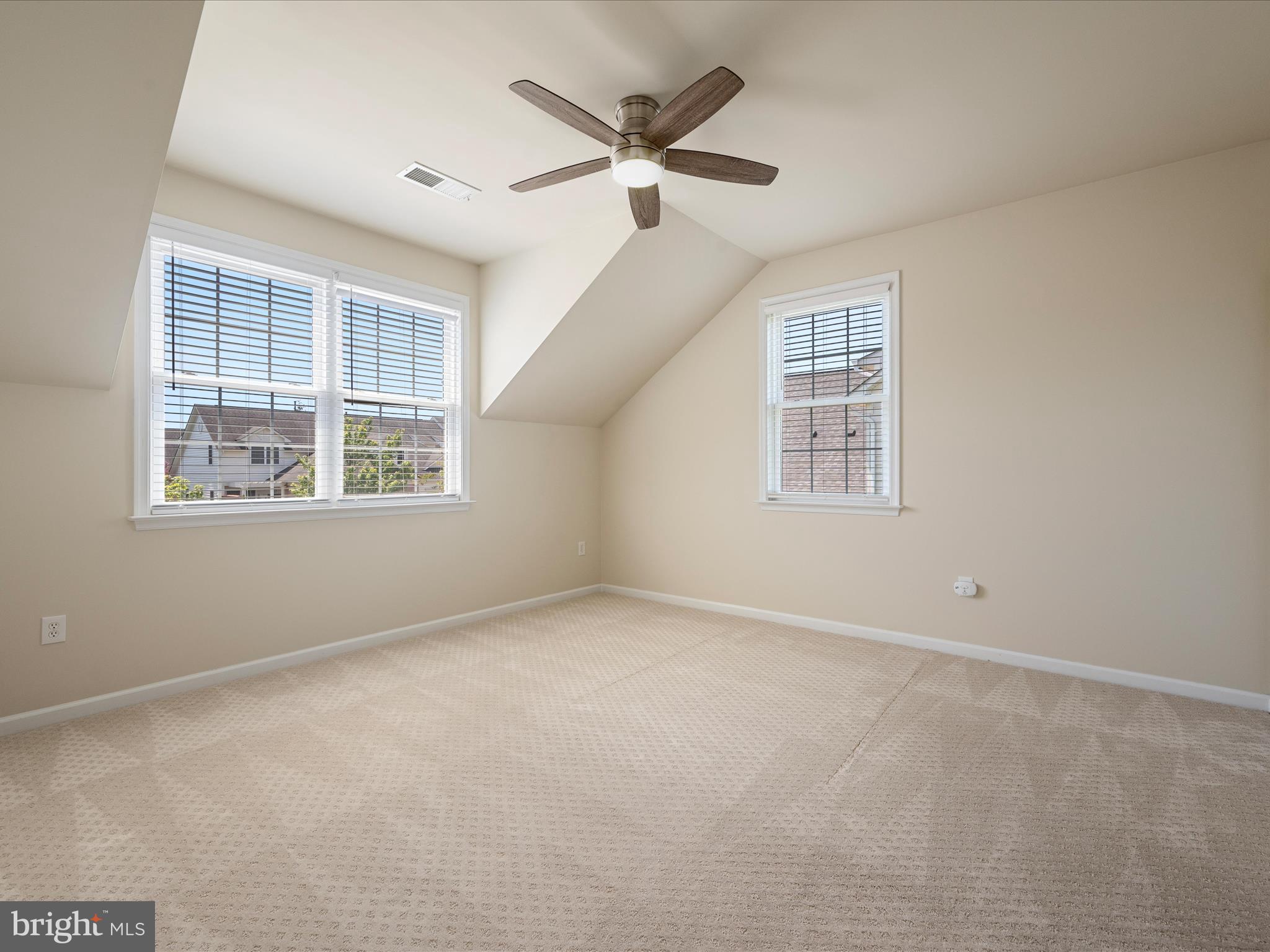 44322 Stableford Square Ashburn, VA 20147 - Photo 32 of 63 an empty room with windows and ceiling fan