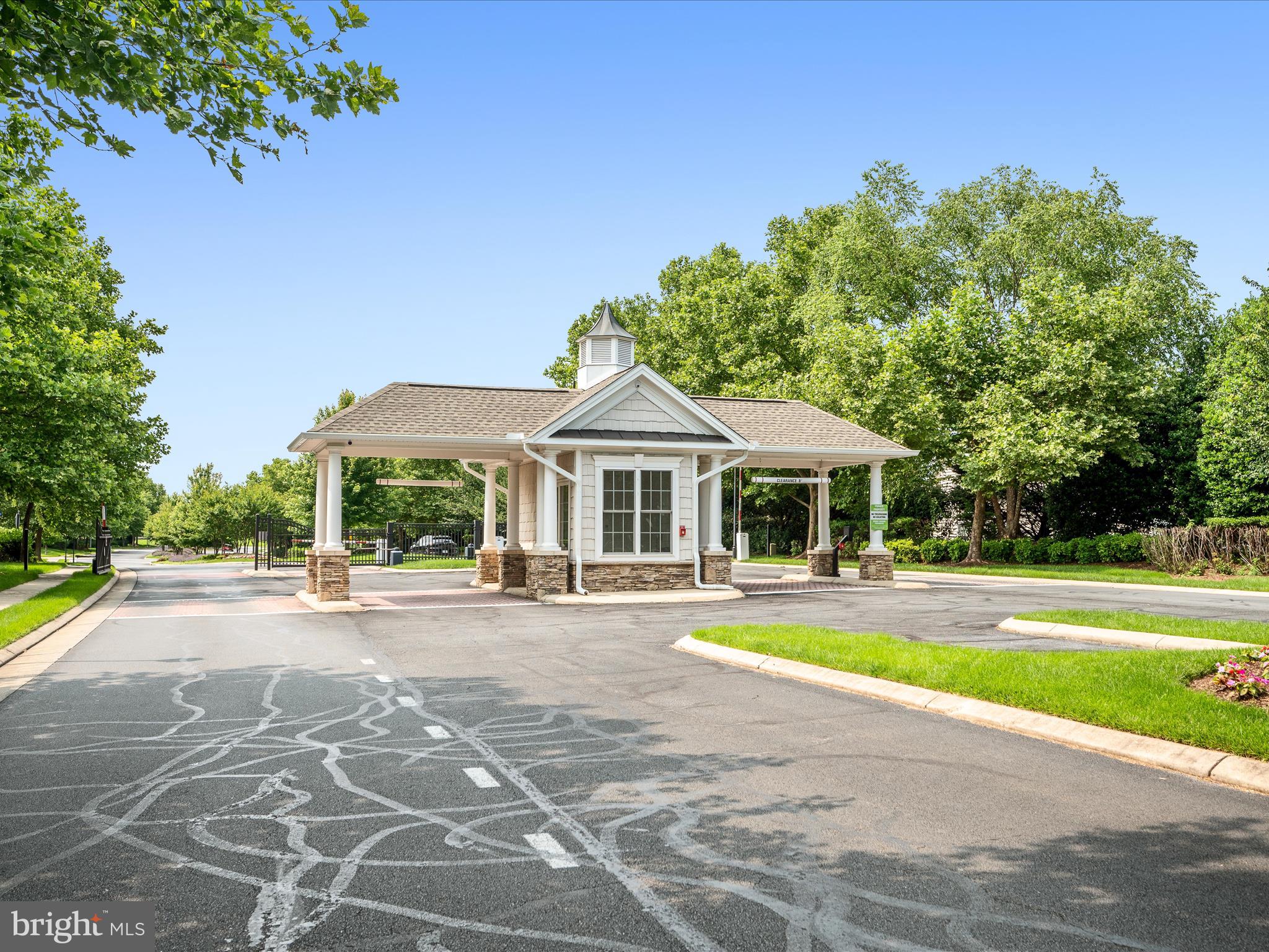 44322 Stableford Square Ashburn, VA 20147 - Photo 49 of 63 a view of a house with a yard and swimming pool