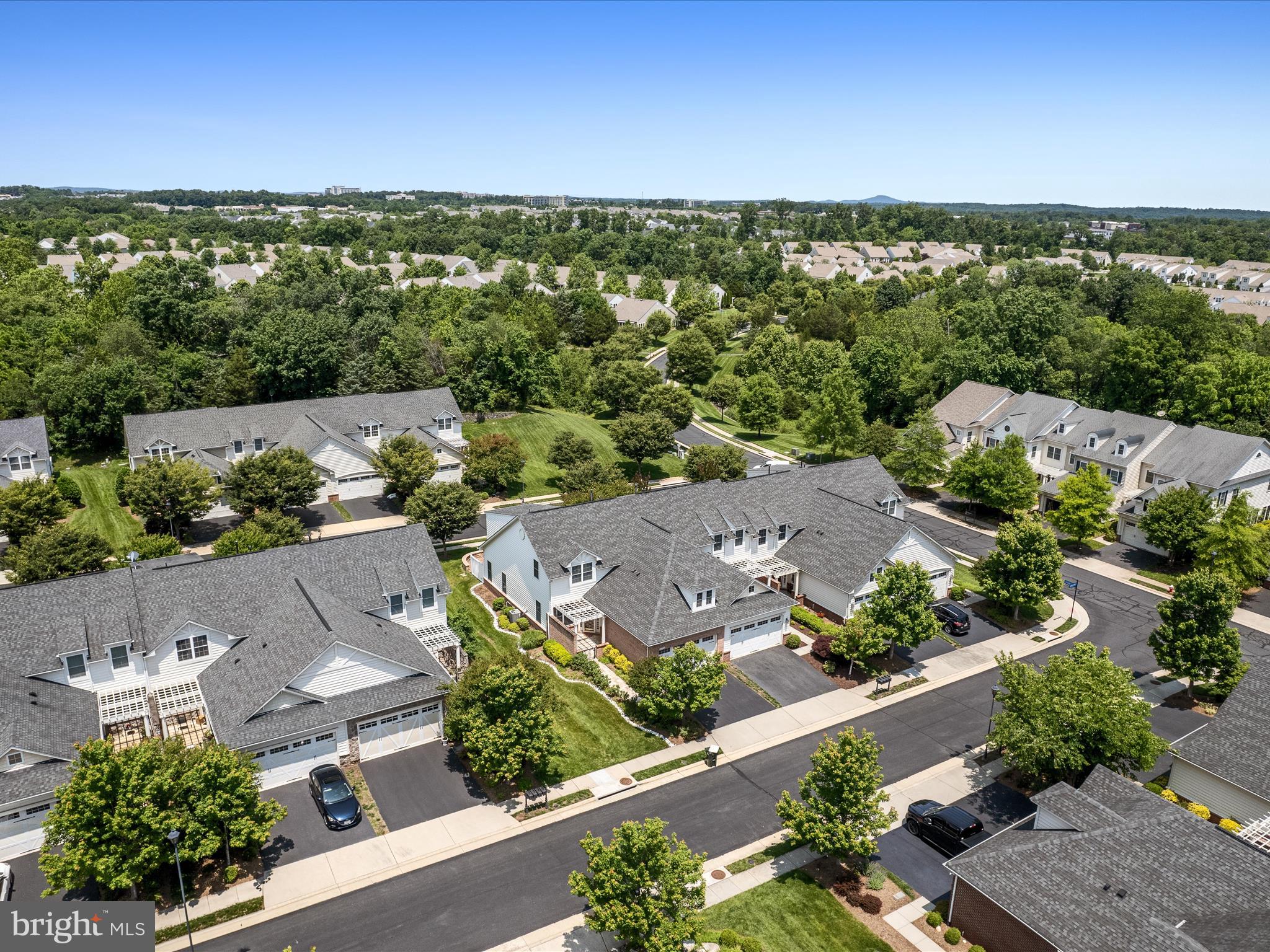 44322 Stableford Square Ashburn, VA 20147 - Photo 51 of 63 an aerial view of residential houses with outdoor space