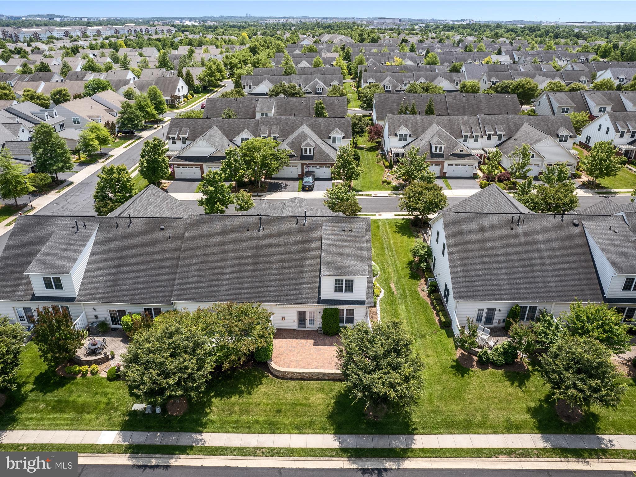 44322 Stableford Square Ashburn, VA 20147 - Photo 52 of 63 an aerial view of a house with a garden