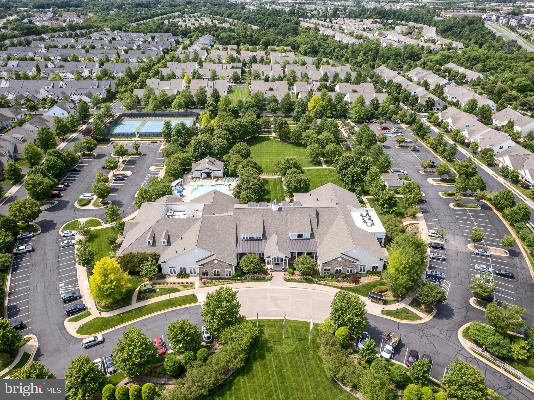 44322 Stableford Square Ashburn, VA 20147 - Photo 56 of 63 an aerial view of a house with a garden