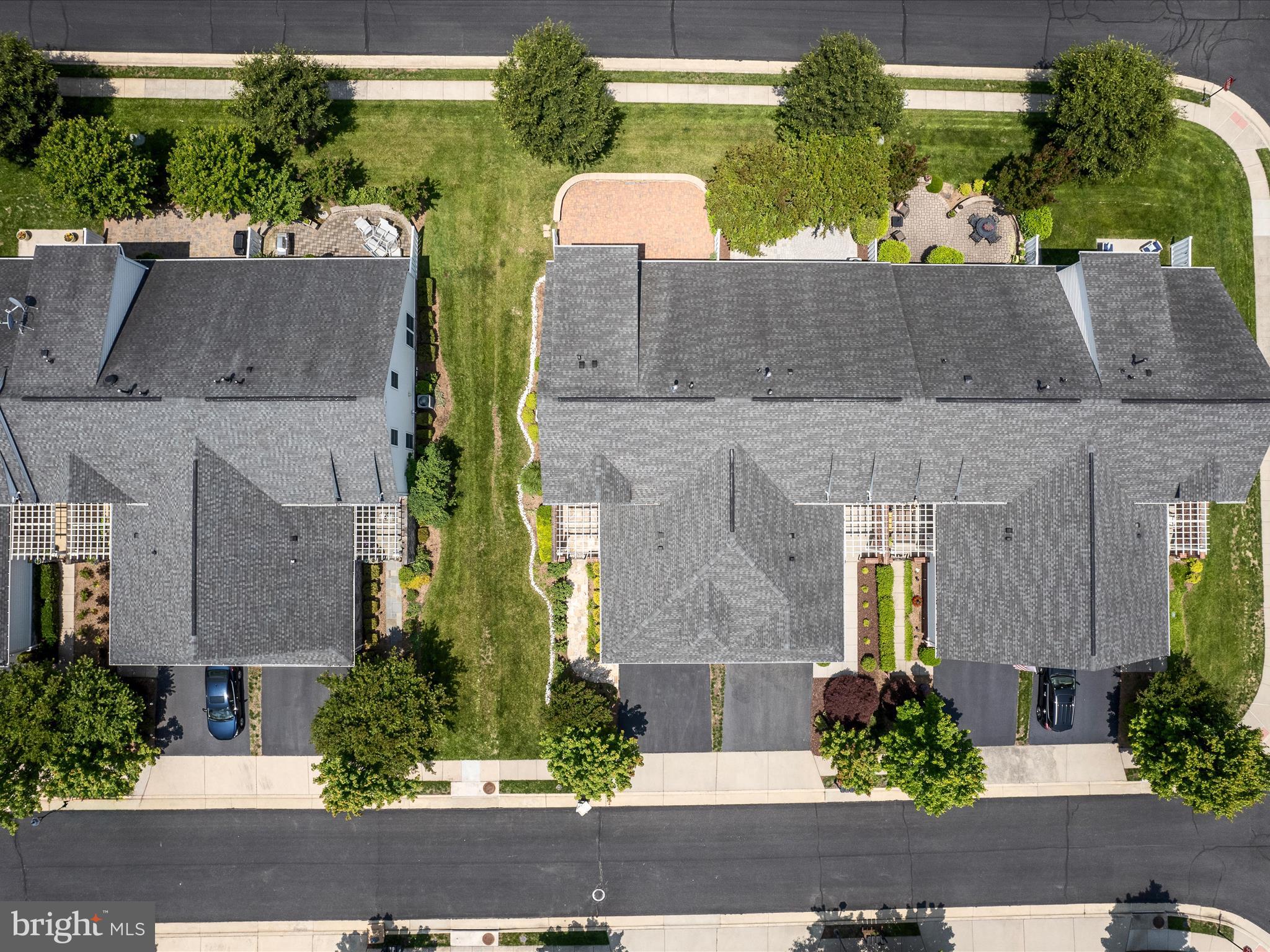 44322 Stableford Square Ashburn, VA 20147 - Photo 57 of 63 an aerial view of a house with a yard and a garden
