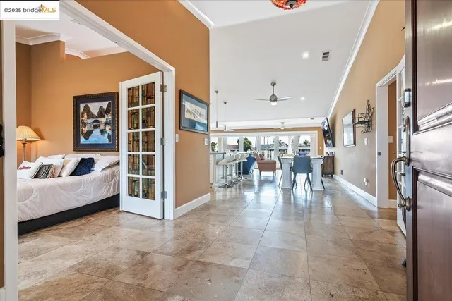 a view of livingroom with furniture and workspace