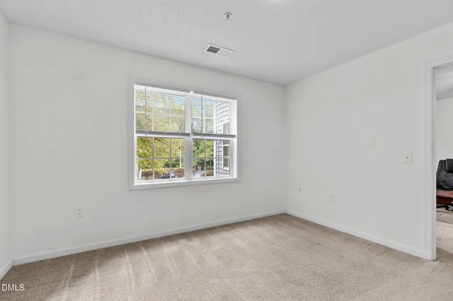 $279,000 | 3020 Centennial Woods Drive, Unit 101, Raleigh, NC 27603